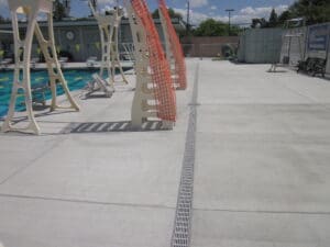 University swimming and diving pool trench drain system