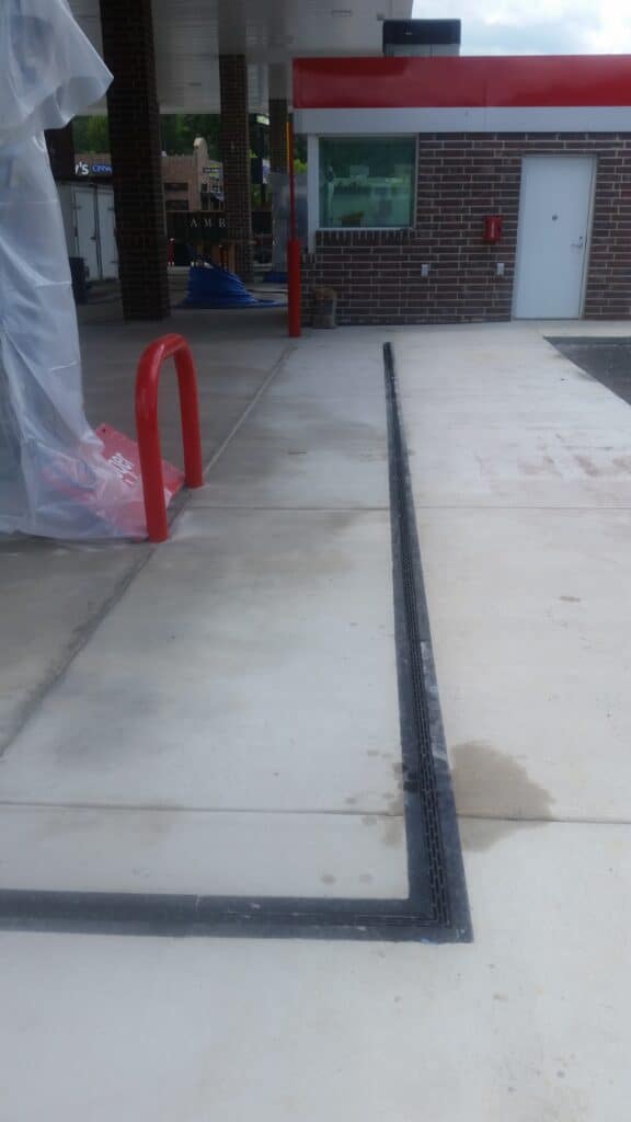 Heel guard channel drains