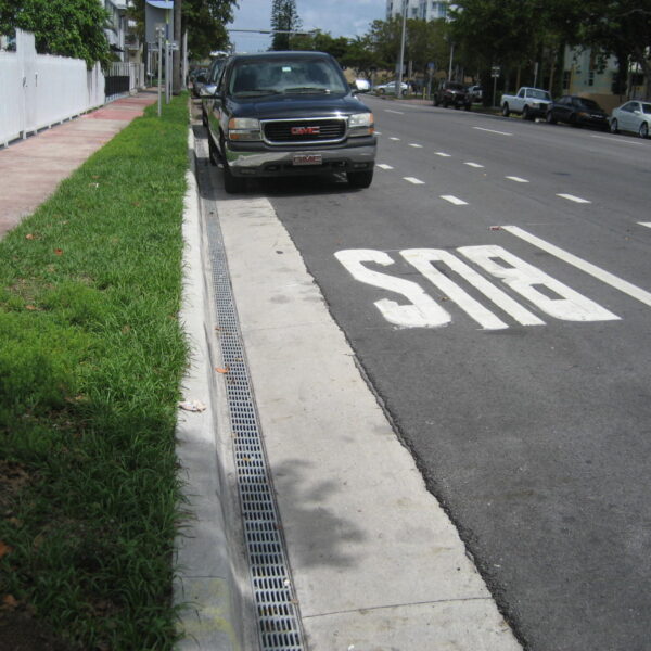 slotted trench drain grate in gutter