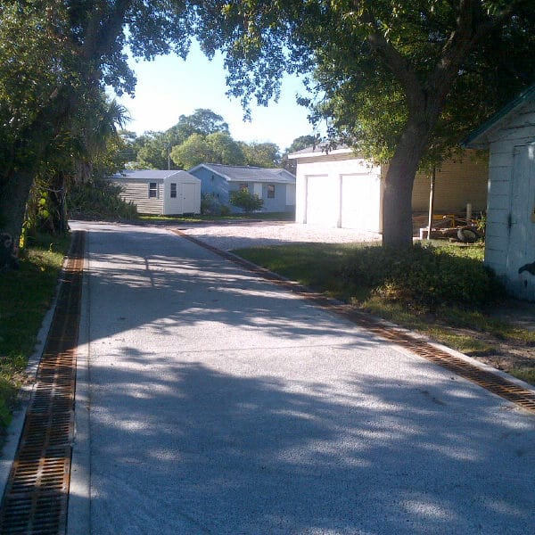 Cast iron trench drain grates in roadway