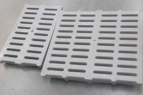 Compression molded fiberglass trench drain grates