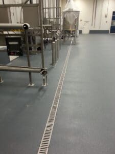Food blending plant with stainless steel trench drain
