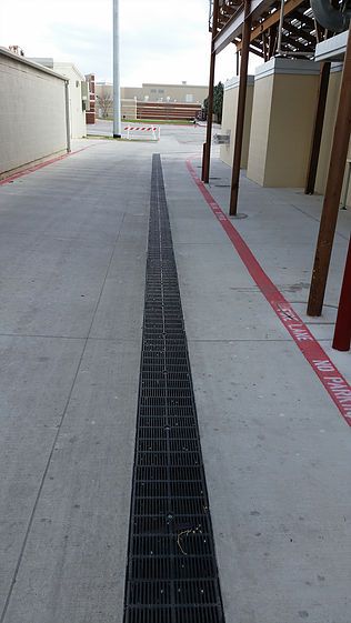 Stadium walkway trench drain system