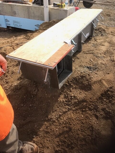 prefabricated turn in a utility trench drain installation